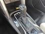 Toyota Corolla Cross 2.0 High Power Hybrid First Edition BLIND-SPOT EL-ACHTERKLEP LM-VELGEN KEYLESS PARK-SENSOREN STOELVERW DRAADLOOS-LADEN AD-CRUISE BLUETOOTH