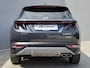 Hyundai Tucson 1.6 T-GDI PHEV Comfort Smart Sky 4WD / Fabrieksgarantie tot 02-2029 / Dealer onderhouden / Glazen schuif- en kanteldak / Stuur- & Stoelverwarming / Trekgewicht 1350 kg / Achteruitrijcamera / Apple Carplay Android Auto / Adaptief cruise control /