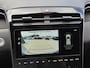 Hyundai Tucson 1.6 T-GDI PHEV Comfort Smart Sky 4WD / Fabrieksgarantie tot 02-2029 / Dealer onderhouden / Glazen schuif- en kanteldak / Stuur- & Stoelverwarming / Trekgewicht 1350 kg / Achteruitrijcamera / Apple Carplay Android Auto / Adaptief cruise control /