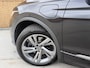 Volkswagen Tiguan 1.4 TSI eHybrid R-Line Business+ Trekhaak uitklapbaar | LED IQ. Light | Getint glas | Achteruitrijcamera | Parkeersensoren voor en achter | Navigatiesysteem | Apple CarPlay/Android Auto | Cruise control adaptief