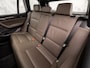 BMW X3 xDrive20i High Executive 184Pk Automaat (PANORAMADAK, 1e EIGENAAR, NAVIGATIE, BRUIN LEDER, SPORTSTOELEN, ZWART HEMEL, GETINT GLAS, STOELVERWARMING, NIEUWSTAAT)