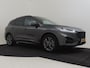Ford Kuga 2.5 PHEV ST-Line X 225PK AUTO | Achteruitrijcamera | Camera voor | B&O Audio | SOH 83% | Parkeer assistent | Electrische acterklep | Stoel/stuur en achterbank verwarming | Adaptief cruise control | Navigatie | Dodehoek detectie | Apple carplay android auto | Keyless entry/start | 18"LMV