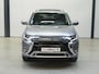 Mitsubishi Outlander 2.4 PHEV Intense+ ✅Stoel&Stuur verw.✅Dodehoek✅Trekhaak✅Elect. Achterklep✅Schuifdak✅Navi✅Cruise✅
