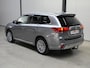 Mitsubishi Outlander 2.4 PHEV Intense+ ✅Stoel&Stuur verw.✅Dodehoek✅Trekhaak✅Elect. Achterklep✅Schuifdak✅Navi✅Cruise✅