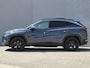 Hyundai Tucson 1.6 T-GDI PHEV Premium Sky 4WD / Glazen schuif- en kanteldak / Rondomzicht camera / Trekgewicht 1.350 kg / Elektrische achterklep / Stuur- Stoel & Achterbank verwarming / Adaptief cruise control / Stoelventilatie / Apple Carplay Android Auto /