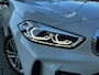 BMW 1-Serie 118i High Executive M-sport | M-AERODYNAMICA| SFEERVERLICHTING| NAVIGATIE + APPLE CARPLAY/ANDROID AUTO| PARKEERSENSOREN V+A| FULL LED| KEYLESS| GETINT GLAS|