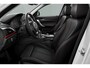 BMW 1-Serie 118i Sport Line | Sportstuur | Stoelverwarming | Xenon adaptief | PDC | Climate control | Sportstoelen | Navigatie | Bluetooth | 18 inch | Lichtpakket | Leer | 18 inch