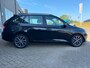 Skoda Fabia Combi 1.2 TSI Drive van 2de Eig met parkeersensoren en navigatie en bluetooth telefoon / media en airco