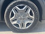 Hyundai Santa Fe 1.6 T-GDI PHEV Premium Sky / Fabrieksgarantie tot 05-2027 / Accu SoH 100 % EAER 58 km / Leder / Panorama Schuifdak / Afn. trekhaak 1.350 kg  / HUD / Elektrische stoelen & klep / Stoelventilatie / Stuur-, stoel- & achterbankverwarming / 19"LM wielen /