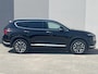 Hyundai Santa Fe 1.6 T-GDI PHEV Premium Sky / Fabrieksgarantie tot 05-2027 / Accu SoH 100 % EAER 58 km / Leder / Panorama Schuifdak / Afn. trekhaak 1.350 kg  / HUD / Elektrische stoelen & klep / Stoelventilatie / Stuur-, stoel- & achterbankverwarming / 19"LM wielen /