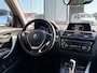 BMW 1-Serie 118i EDE Corporate Lease Essential | Cruise | Navi | LED | 18 Inch |