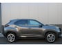 Toyota Yaris Cross 1.5 Hybrid EXE, PDC, STOEL/STUURVERWARMING PANODAK, HEAD-UP, TREKHAAK, LED