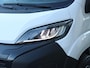 Peugeot e-Boxer 3.5t L4H3 Zwaar 110 kWh | 1ste eigenaar | AppleCarPlay/AndroidAuto | Navigatie | Cruise Control | Climate Control | Keyless | LED | Camera | 3 zits | Laadvloer | Parkeersensoren |