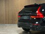Volvo XC60 T6 AWD Recharge Plus Dark Long Range | Trekhaak | Harman Kardon | Adaptieve Cruise Control | Stoelverwarming voor+achter | Stuurwielverwarming | Parkeercamera | Full LED Meesturende koplampen | Pilot Assist | Elektrische voorstoelen geheugen | R-Design Contour stoelen met wit stiksel en bies | Zitting verlenging voorstoelen | Schuifdak | Google Infotainment | 19 Inch | Keyless Drive | Parkeersensoren voor+achter | Privacy Glass | DAB Radio | Apple Carplay/Android Auto | Draadloos telefoon opladen | Volvo On Call met mobiele App functie | Onyx Black Metallic |