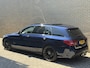Mercedes-Benz C-klasse Estate 180 Business Solution AMG | Panoramadak | Trekhaak elektrisch wegklapbaar | Distronic | Camera | Sportstoelen | Lederen bekleding | Stoelverwarming | Navigatie | Apple CarPlay | 19 inch velgen | Sfeerverlichting | Elektrische achterklep | LED | Volledig dealeronderhouden