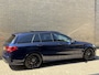 Mercedes-Benz C-klasse Estate 180 Business Solution AMG | Panoramadak | Trekhaak elektrisch wegklapbaar | Distronic | Camera | Sportstoelen | Lederen bekleding | Stoelverwarming | Navigatie | Apple CarPlay | 19 inch velgen | Sfeerverlichting | Elektrische achterklep | LED | Volledig dealeronderhouden