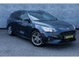Ford Focus Wagon 1.0 EcoBoost Hybrid 125 ST Line X Business | Achteruitrijcamera | Parkeersensoren | Stoelverwarming | LED Koplampen | Climate Control | Cruise Control | Navigatie | Apple Carplay | Android Auto | Keyless Entry | Elektrische Achterklep