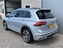 Volkswagen Tiguan 1.4 TSI eHybrid R-Line / AUTOMAAT/ 245 PK/ 2X R-LINE/ PANO/ TREKHAAK/ CAMERA/ KEYLESS/ IQ. LIGHT/ DCC/ DODE HOEK/ STOELVERWARM. V&A/ STUURVERWARM./ ADAPT. CRUISE/ APP CONNECT/ NAVI/ 20" LMV