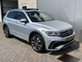 Volkswagen Tiguan 1.4 TSI eHybrid R-Line / AUTOMAAT/ 245 PK/ 2X R-LINE/ PANO/ TREKHAAK/ CAMERA/ KEYLESS/ IQ. LIGHT/ DCC/ DODE HOEK/ STOELVERWARM. V&A/ STUURVERWARM./ ADAPT. CRUISE/ APP CONNECT/ NAVI/ 20" LMV