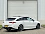 Mercedes-Benz CLA Shooting Brake 200 Business Solution AMG / Schuif- en Kantel Dak / Apple Carplay & Android Auto / Elektrisch Verstelbare Stoelen / Stoelverwarming / Elektrische Achterklep / Trekhaak /