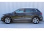 Volkswagen Tiguan 1.4 TSI eHybrid R Business+ | Incl. 12 maanden garantie | Adaptieve cruise control | Uitklapbare trekhaak | Schuif/kantel dak | Climate control | Apple carplay/Android auto | Navigatie | DAB radio | Parkeercamera |
