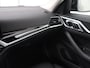 BMW i4 eDrive40 84 kWh | SOH 93,8% | Camera | Adaptive cruise | Climate control | Navigatie | DAB+ | Bluetooth | Stoelverwarming | Carplay
