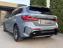 BMW 1-Serie M135i xDrive Edition Colorvision M Sport Pano HUD Camera