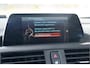 BMW 1-Serie 118i | Schuif/Kanteldak | Navi | Trekhaak | Stoelverw. | PDC | Clima | Cruise