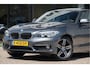 BMW 1-Serie 118i | Schuif/Kanteldak | Navi | Trekhaak | Stoelverw. | PDC | Clima | Cruise