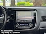 Mitsubishi Outlander 2.0 4WD Instyle Automaat 7Persoons Sch-Dak Carplay Navi Climate Cruise Ctr Afn Trekhaak Stoel+Stuurverwarming
