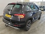 Skoda Karoq 1.5 TSI 150pk Automaat Sportline Business | Panoramadak | Stuur- en Stoelverwarming | Camera | PDC V+A | CarPlay | 19"