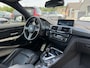 BMW M4 4-serie Coupé Competition | 360* Camera | Kuipstoelen | Carbon | Head-Up Display |