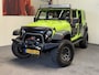Jeep Wrangler UNLIMITED 3.6 SAHARA LEDER STOELVERWARMING TARGA DAK CRUISE CONTROL CLIMATE CONTROL MEDIA VOORBEREIDING ACHTERUITRIJCAMERA LIER LED BAR TREKHAAK ENZ