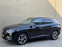Hyundai Tucson 1.6 T-GDI PHEV 4WD | Adaptieve cruise | Trekhaak afneembaar | Navigatie | Camera  | Apple CarPlay | Stoel&stuurverwarming | LED | DAB | Keyless | 19 inch velgen | Volledig onderhouden