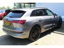 Audi E-tron e-tron 55 quattro advanced Pro Line Plus 95 kWh | SoH 92% | Incl. 12 maanden Garantie | Panorama dak | Luchtvering | Bang & Olufsen Audiosysteem | Elektrisch verstelbare stoelen met memory | Soft close | Afneembare trekhaak | 360° Camera | Adaptive cruise controle | Keyless entry/start | Head-Up Display | Stoelverwarming | Elektrische kofferbakklep | Dodehoeksensoren | Apple CarPlay/Android Auto | Draadloze telefoonlader | 22 Inch LMV | Navigatie |