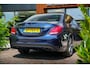 Mercedes-Benz C-klasse 180 Business Solution AMG Panoramadak 3D Burmester Ambient Camera Stoelverwarming Leer Cruise Control