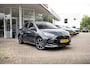 Toyota Yaris Full Hybrid Dynamic Plus Automaat | Nieuw uit doos!! | Storm Grey Metallic | Dodehoeksensoren | Carplay | Stoel- en Stuurverwarming | Adapt.Cruise