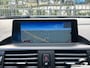 BMW 1-Serie 118I Business+ A Navi airco Cruise Trekhaak NAP-Autopas