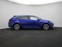 Toyota Corolla Touring Sports 1.8 Hybrid First Edition | Elek. Kofferklep | Parkeersensoren | Half lederen bekleding |