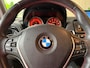 BMW 1-Serie 116i Upgrade Edition Airco, Navigatie, LMV, Lederen bekleding, 6 versnellingen.