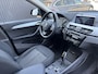 BMW X1 sDrive20i Sportif | All-Black | Uniek | Custom | 19 inch | Nav