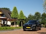 BMW X1 sDrive20i Sportif | All-Black | Uniek | Custom | 19 inch | Nav