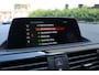 BMW 1-Serie 118i Sport Aut (Orig NL! NAP! Sportinterieur Navi Cruise Led Trekhaak Lmv Pdc)