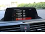 BMW 1-Serie 118i Sport Aut (Orig NL! NAP! Sportinterieur Navi Cruise Led Trekhaak Lmv Pdc)