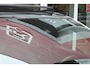 Alfa Romeo Junior 1.2 145PK AUTOMAAT Hybrid IBRIDA SPECIALE | PANORAMA SCHUIF/KANTEL DAK | AFNEEMBARE TREKHAAK | TECHNO PACK: LED MATRIX KOPLAMPEN/AUTOMATISCH DIMMENDE BINNENSPIEGEL/DRAADLOZE TELEFOONLADER/ELEKTRISCH VERSTELBARE EN VERWARMBARE ZIJSPIEGELS MET DODEHOEK DETECTIE, ELEKTRISCH INKLAPBAAR/NAVIGATIE/HANDS-FREE ACHTERKLEP/KEYLESS ENTRY/USB TYPE C/ADAPTIVE CRUISE CONTROL MET LANE CENTERING EN FILE-ASSISTENT/ACHTERUITRIJ CAMERA MET DYNAMISCHE RIJLIJNEN/AUDIOSYSTEEM MET 6 SPEAKERS | PREMIUM PACK: "SPIGA" STOFFEN/ECOLEDER BEKLEDING MET RODE ACCENTEN - 6-VOUDIG ELEKTRISCH VERSTELBARE BESTUURDERSSTOEL, 6-VOUDIG VERSTELBARE PASSAGIERSSTOEL/VERWARMBARE VOORSTOELEN/LEDEREN STUURWIEL/AMBIENT LIGHT/INTERIEURVERLICHTING VOOR EN ACHTER MET LED TOUCH/DONKERE GETINTE ACHTERRUITEN/HOOGGLAS ZWARTE BODYKIT MET RODE ACCENTEN | 18" LICHTMETALEN VELGEN "PETALI" | DRAADLOZE APPLE CARPLAY/ANDROID AUTO |
