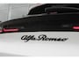 Alfa Romeo Junior 1.2 145PK AUTOMAAT Hybrid IBRIDA SPECIALE | PANORAMA SCHUIF/KANTEL DAK | AFNEEMBARE TREKHAAK | TECHNO PACK: LED MATRIX KOPLAMPEN/AUTOMATISCH DIMMENDE BINNENSPIEGEL/DRAADLOZE TELEFOONLADER/ELEKTRISCH VERSTELBARE EN VERWARMBARE ZIJSPIEGELS MET DODEHOEK DETECTIE, ELEKTRISCH INKLAPBAAR/NAVIGATIE/HANDS-FREE ACHTERKLEP/KEYLESS ENTRY/USB TYPE C/ADAPTIVE CRUISE CONTROL MET LANE CENTERING EN FILE-ASSISTENT/ACHTERUITRIJ CAMERA MET DYNAMISCHE RIJLIJNEN/AUDIOSYSTEEM MET 6 SPEAKERS | PREMIUM PACK: "SPIGA" STOFFEN/ECOLEDER BEKLEDING MET RODE ACCENTEN - 6-VOUDIG ELEKTRISCH VERSTELBARE BESTUURDERSSTOEL, 6-VOUDIG VERSTELBARE PASSAGIERSSTOEL/VERWARMBARE VOORSTOELEN/LEDEREN STUURWIEL/AMBIENT LIGHT/INTERIEURVERLICHTING VOOR EN ACHTER MET LED TOUCH/DONKERE GETINTE ACHTERRUITEN/HOOGGLAS ZWARTE BODYKIT MET RODE ACCENTEN | 18" LICHTMETALEN VELGEN "PETALI" | DRAADLOZE APPLE CARPLAY/ANDROID AUTO |