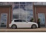 BMW 1-Serie 125i Upgrade Edition | Cruise control | Sportstuur | Stoelverwarming | 218 pk | Sportstoelen | Navigatie | Bluetooth | Xenon | 18 inch | PDC | Climate control | Regensensor