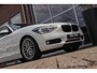 BMW 1-Serie 125i Upgrade Edition | Cruise control | Sportstuur | Stoelverwarming | 218 pk | Sportstoelen | Navigatie | Bluetooth | Xenon | 18 inch | PDC | Climate control | Regensensor