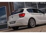 BMW 1-Serie 125i Upgrade Edition | Cruise control | Sportstuur | Stoelverwarming | 218 pk | Sportstoelen | Navigatie | Bluetooth | Xenon | 18 inch | PDC | Climate control | Regensensor