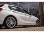 BMW 1-Serie 125i Upgrade Edition | Cruise control | Sportstuur | Stoelverwarming | 218 pk | Sportstoelen | Navigatie | Bluetooth | Xenon | 18 inch | PDC | Climate control | Regensensor